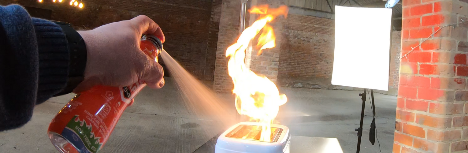 putting out fire using LifeSafe 5-in-1 fire extinguisher