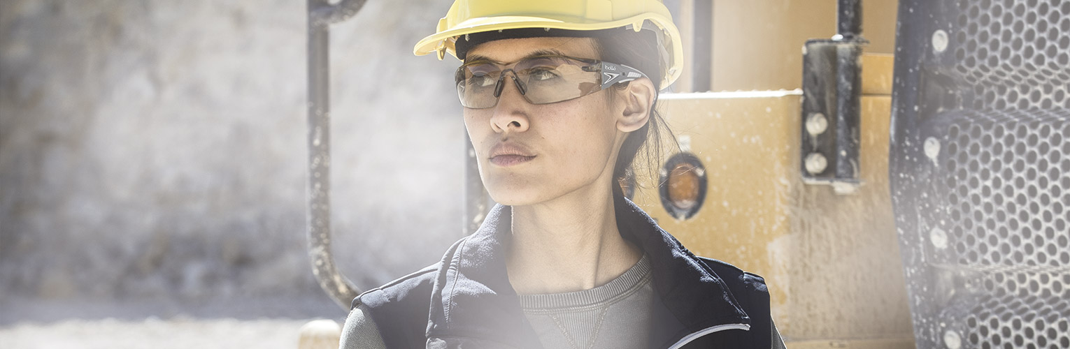 Woman on a construction site wearing safety eyewear