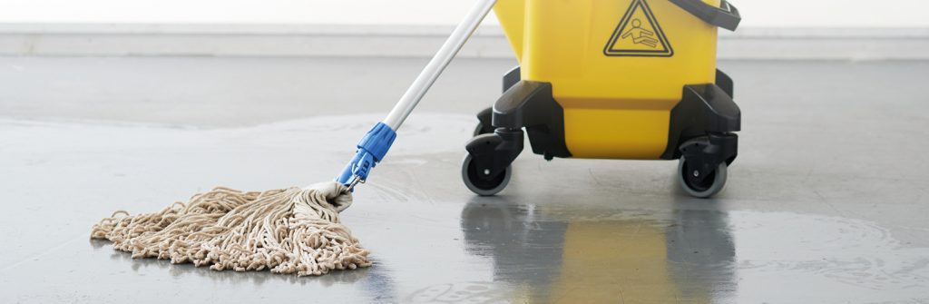 Kentucky mop bucket and mop on a floor