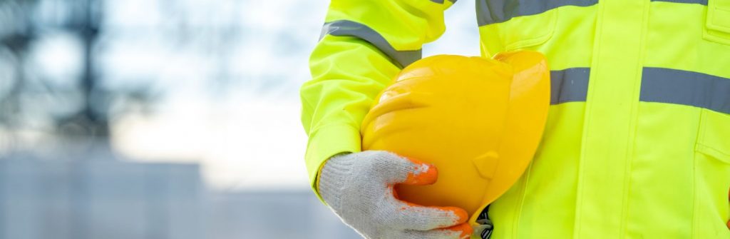 Man holding a safety helmet