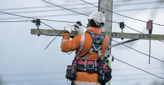 Man in hard hat working at a height