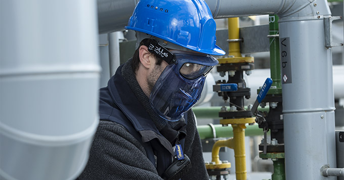 Man wearing safety goggles and mask. 
