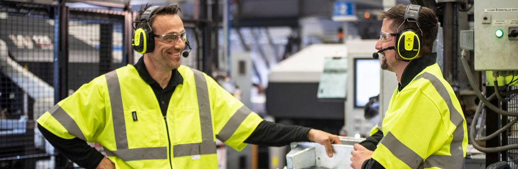 Men wearing PPE head protection