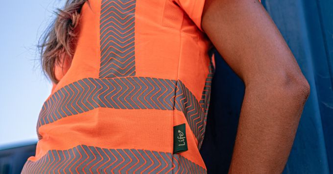 Woman wearing sustainable hi vis